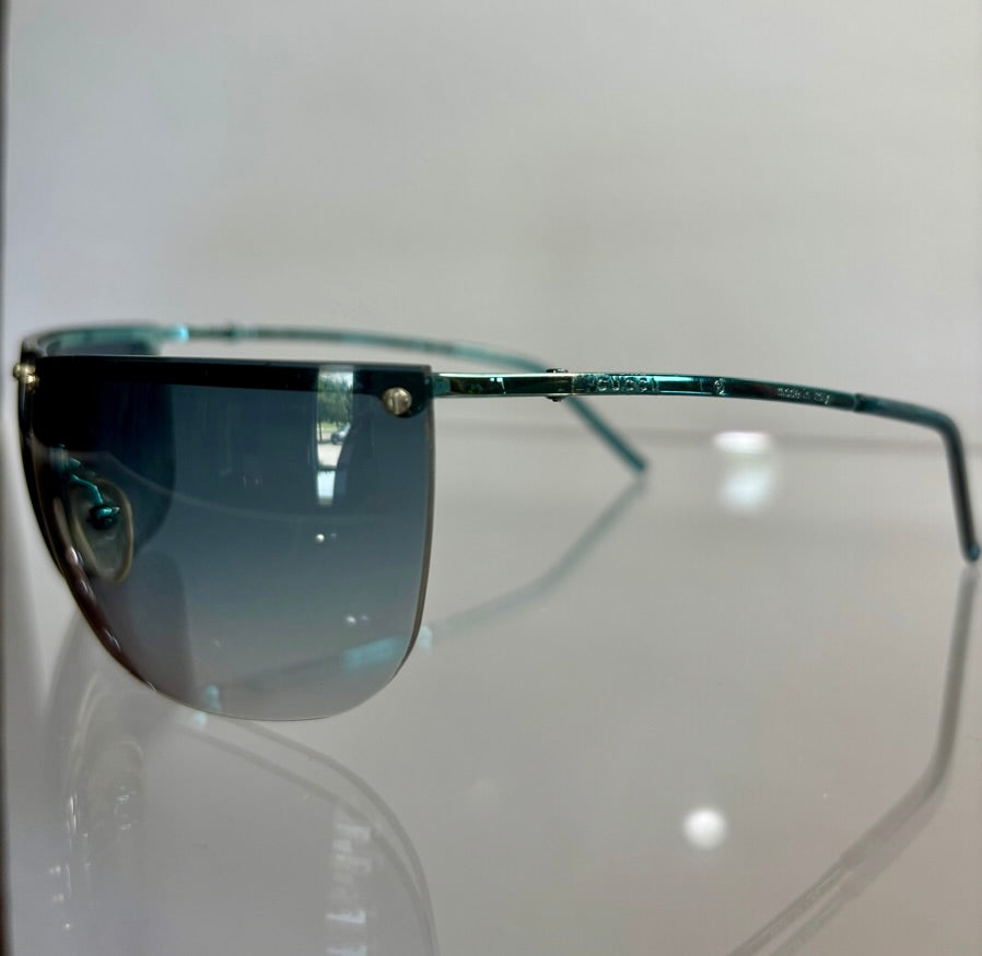 Gucci Blue Tint Rimless Sunglasses