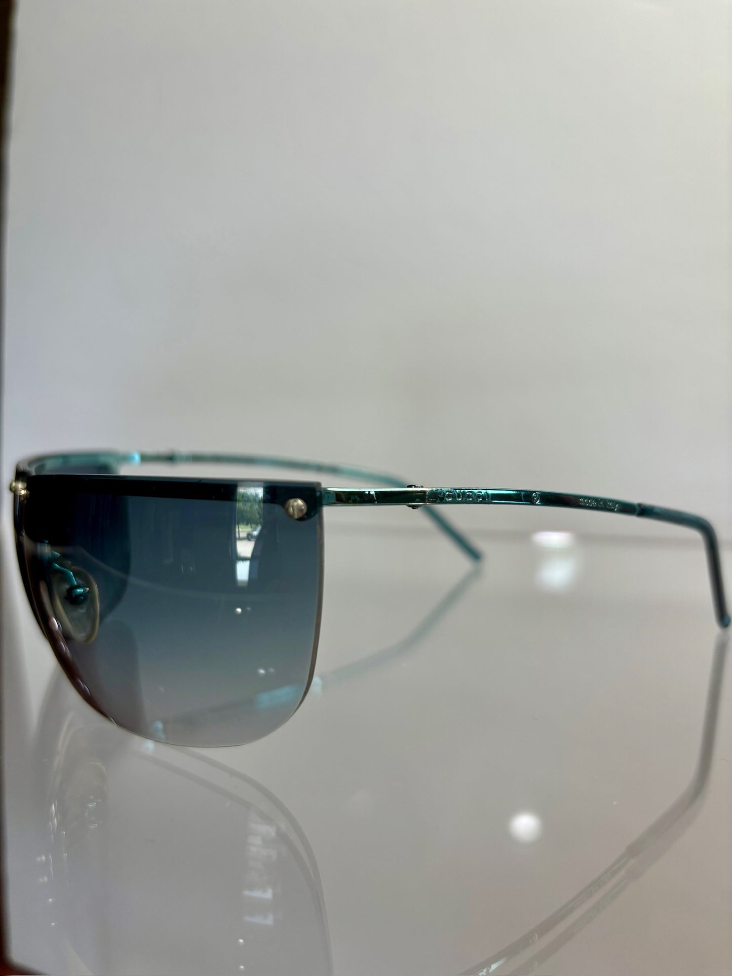 Gucci Blue Tint Rimless Sunglassess